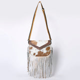 Hair on cowhide fringe purse